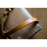 Light tan wallet tether with an Ace wallet